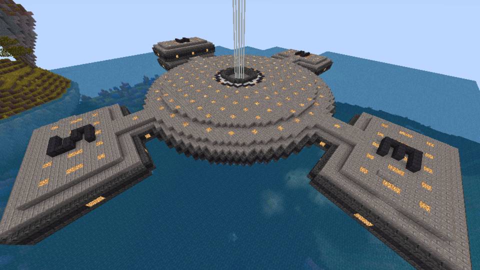 A screenshot of my base. It has a sort of compass-rose design, with a big circle in the center and "leaves" at the ends in each of the cardinal directions.
